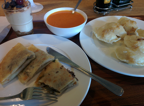 Ruskie pierogi, naleśniki z pieczarkami, carrot-ginger soup, and desert from Vega vegan restaurant.